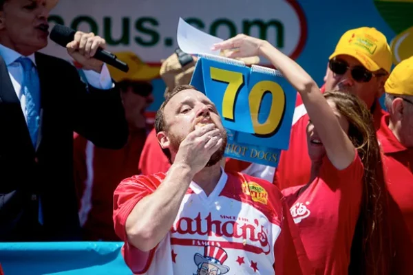 Australian man overcomes illness to eat 47 hotdogs in 10 minutes