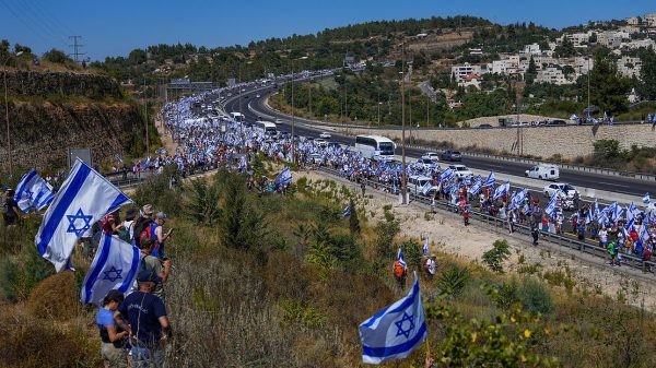 Political Demonstrators Trek Through Israel