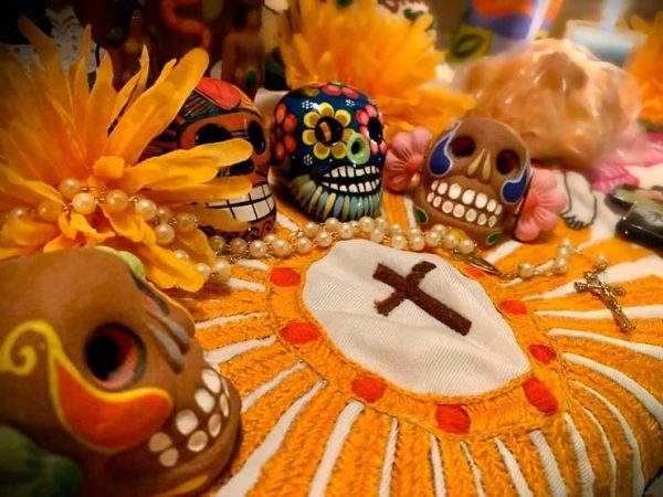 Research how different cultures honor the dead. How does Halloween differ from Día de los Muertos?