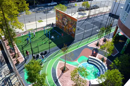 Students Remodel Schoolyard From a Simple Concrete Blacktop to a Playground and Basketball Court