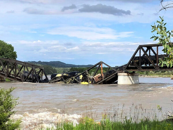 A Train Containing Hot Asphalt and Molten Sulfur Plunges into the Yellowstone River in Montana