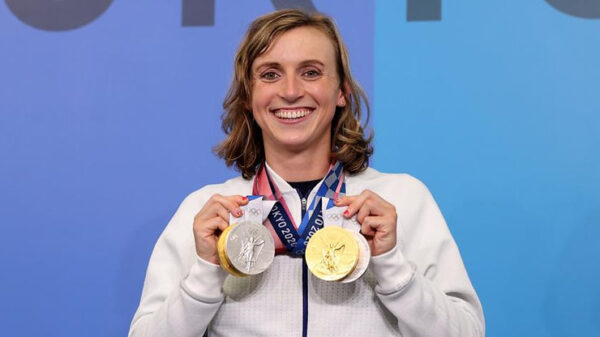 American swimmer Katie Ledecky wins gold in her opening event at the FINA World Championships.