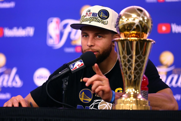 Average sized yet big play maker and point scorer, Stephen Curry, wins NBA Finals MVP award.