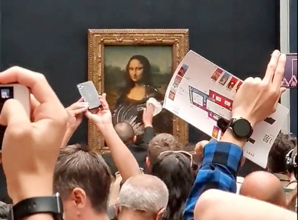 A man was detained after throwing a piece of cake at the Mona Lisa