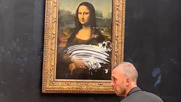 Masked Man Smears Cake on Mona Lisa’s Face