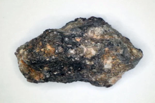 Origin Story of an Odd Rock in a Box Discovered Decades Later
