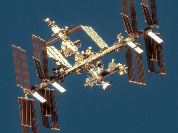 Russian satellite breaks up in space near the ISS, forcing the crew to take shelter